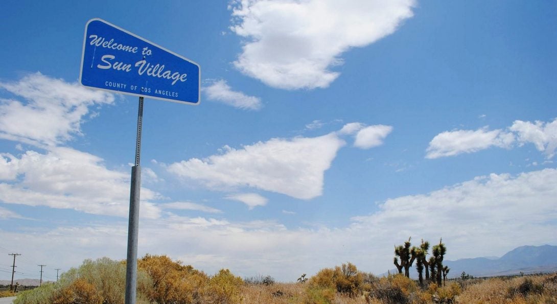 Blue freeway sign that says 